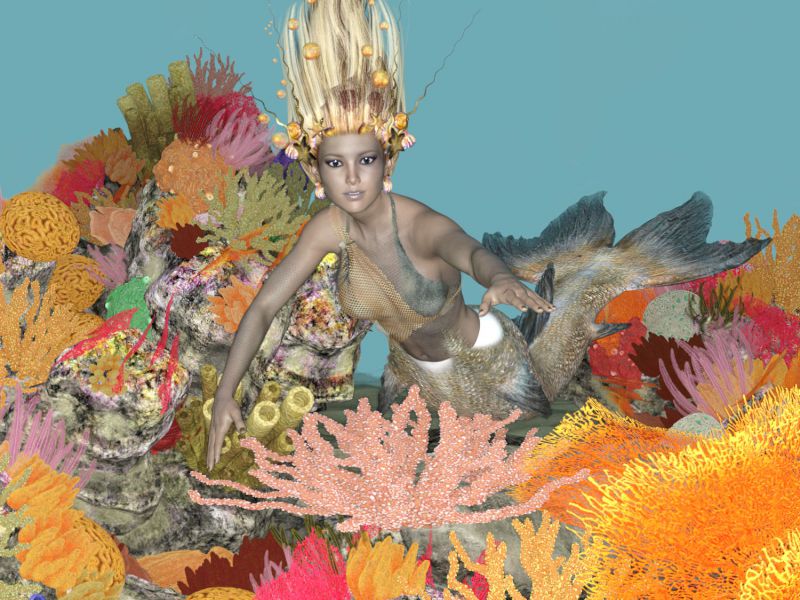 Mermaid swimming through the Coral